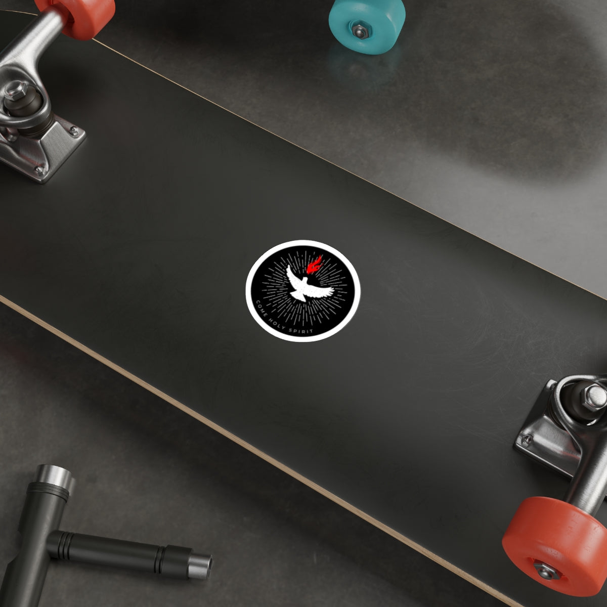Come Holy Spirit Catholic Dove Sticker on a skateboard.